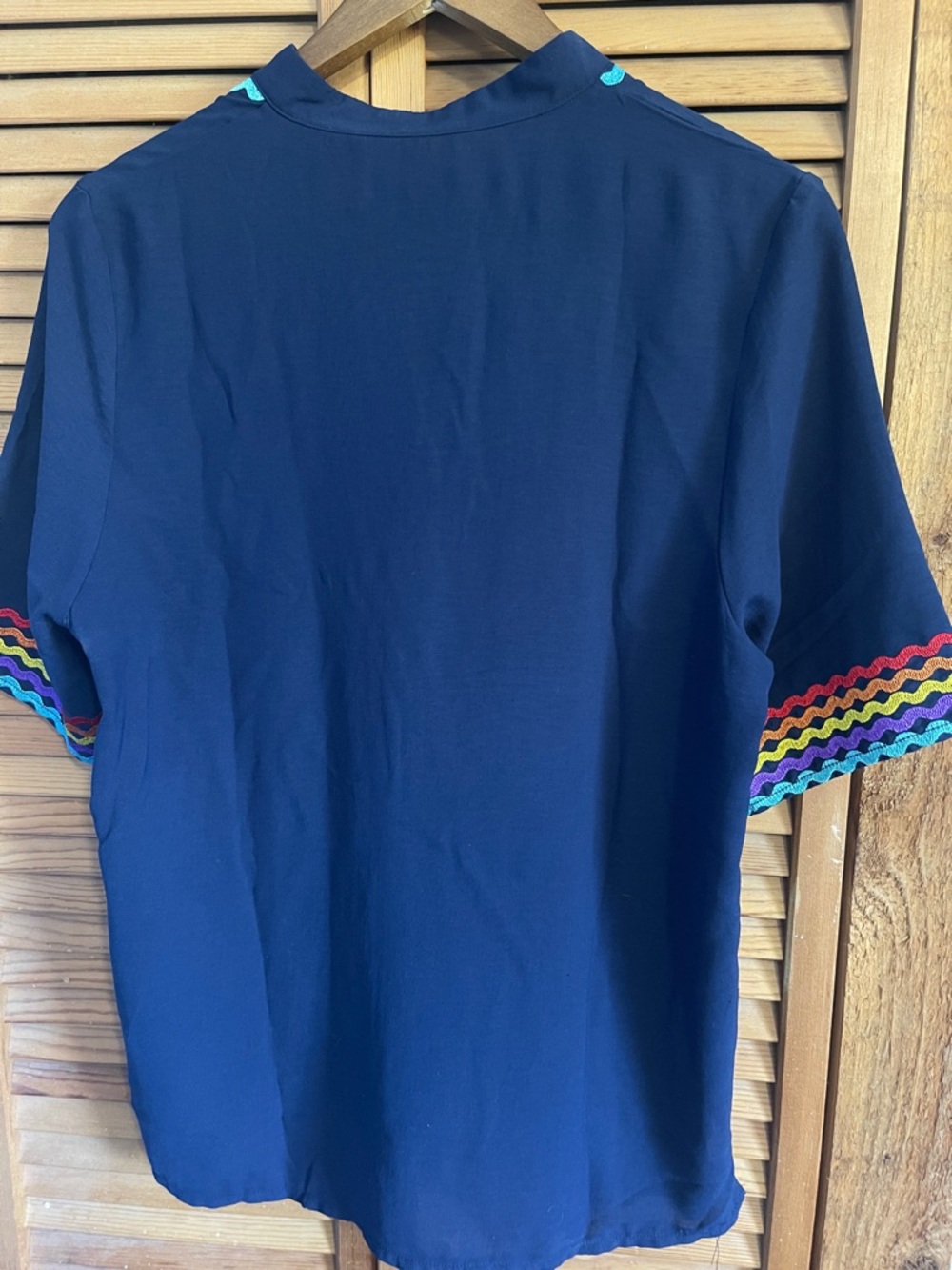 Women’s Navy Embroidered V-Neck Top with Rainbow Trim size medium. - Picture 3 of 3
